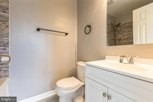 a bathroom with a sink and a toilet