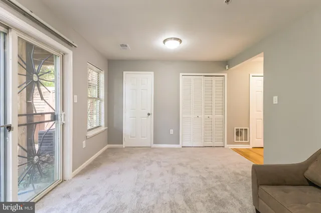 a view of livingroom with furniture and window