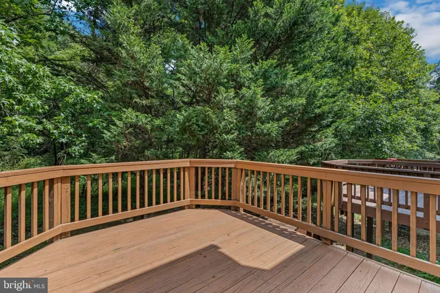 a view of a deck with a large window