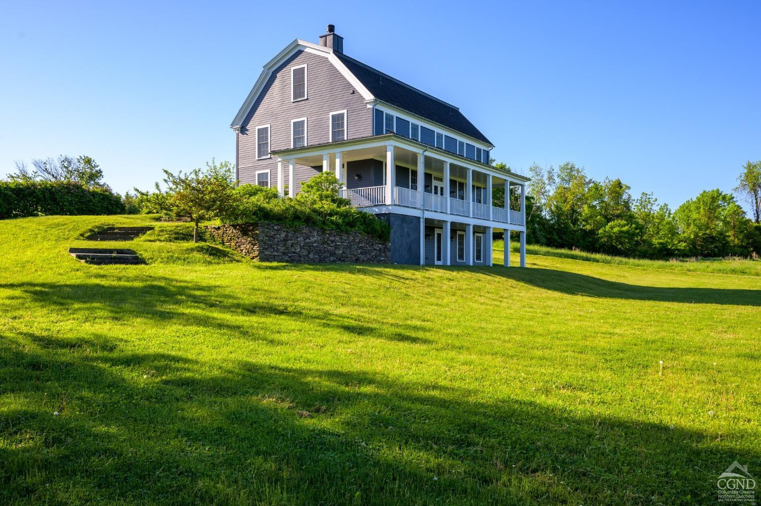 a view of a house with swimming pool