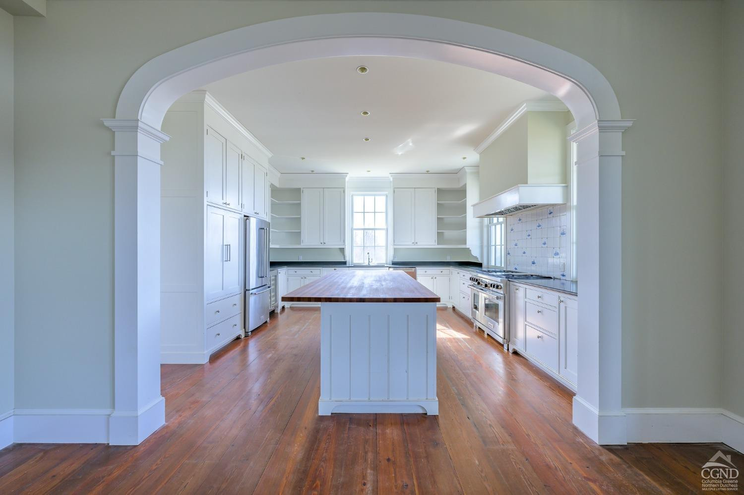 38 Miller Farm Road Claverack, NY 12413 - Photo 11 of 37 a kitchen with stainless steel appliances a refrigerator and wooden floor