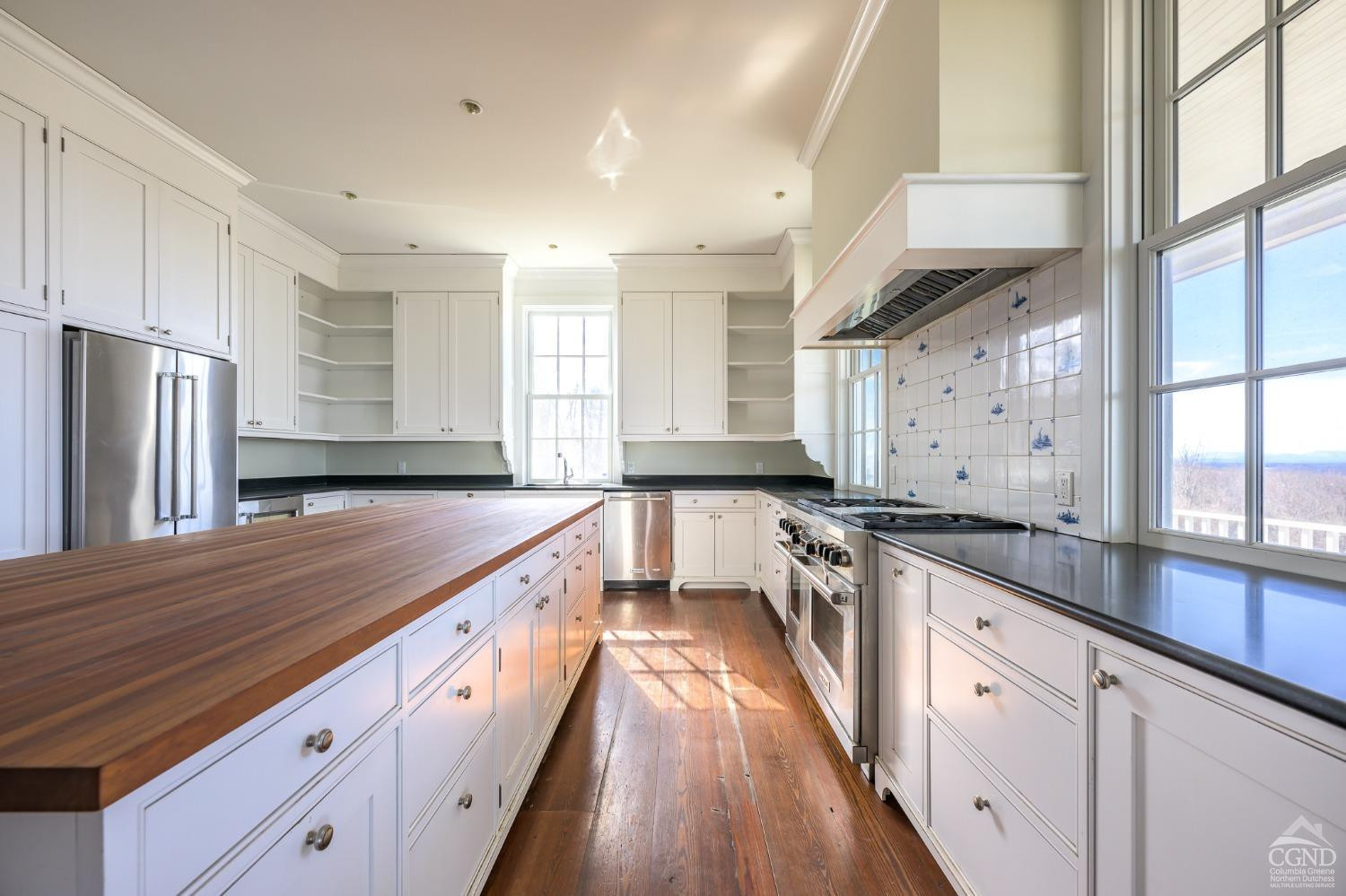 38 Miller Farm Road Claverack, NY 12413 - Photo 12 of 37 a large kitchen with stainless steel appliances granite countertop a lot of counter space and wooden floors