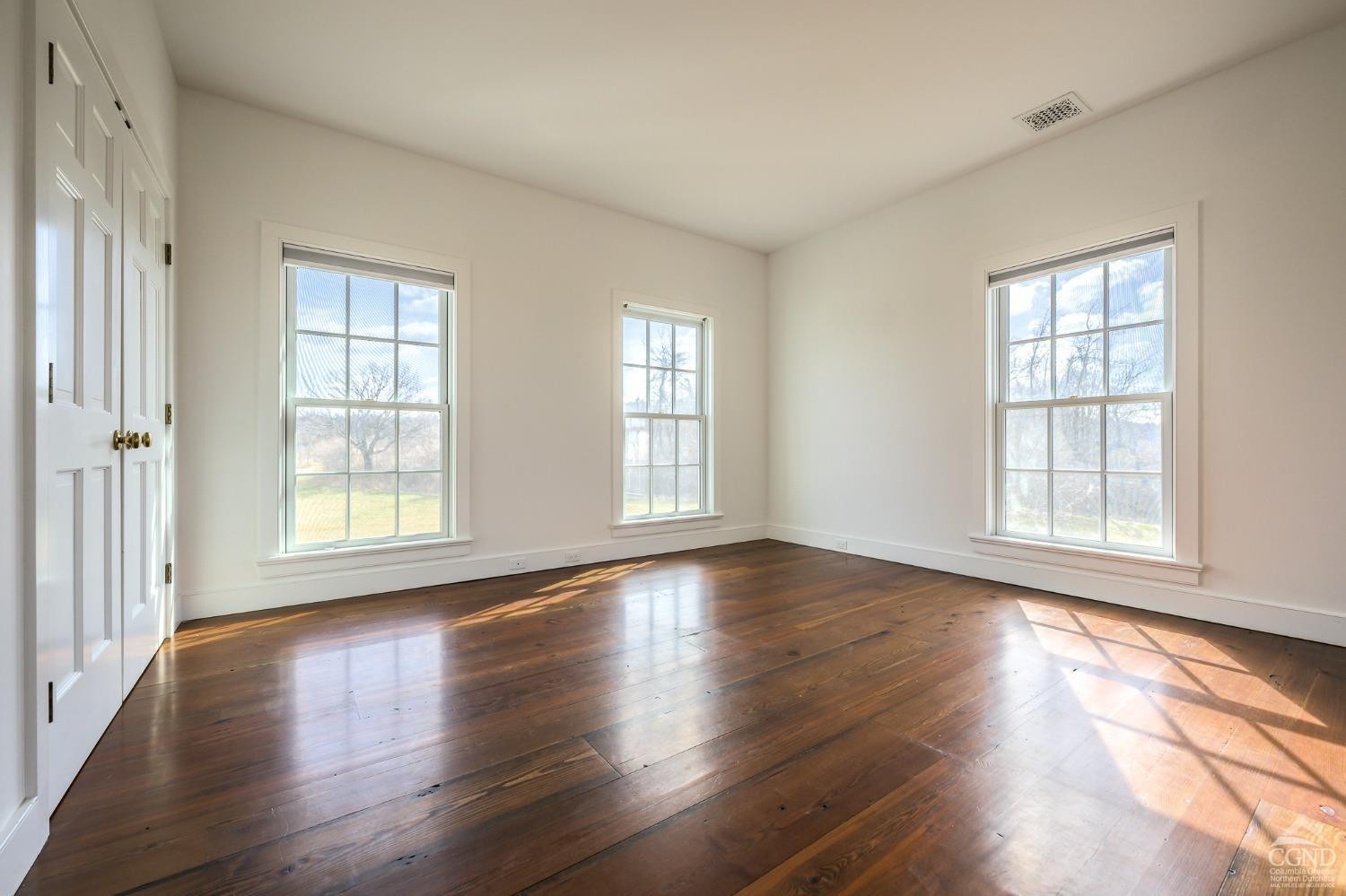 38 Miller Farm Road Claverack, NY 12413 - Photo 21 of 37 a view of an empty room with wooden floor and window