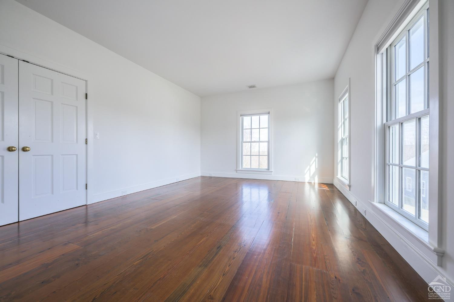 38 Miller Farm Road Claverack, NY 12413 - Photo 22 of 37 a view of an empty room with wooden floor and a window