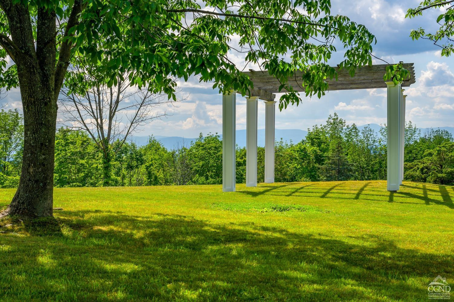 38 Miller Farm Road Claverack, NY 12413 - Photo 29 of 37 a view of a yard with a tree