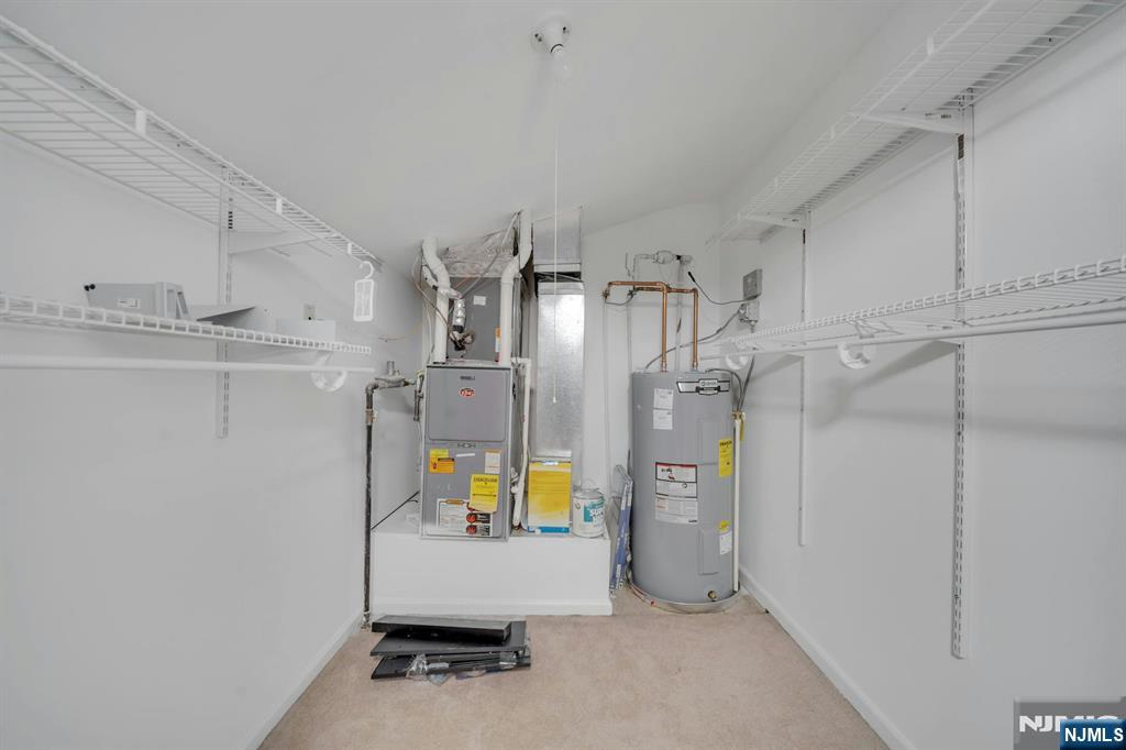 24 Ave At Port Imperial, Unit 401 West New York, NJ 07093 - Photo 16 of 27 a view of storage and utility room with refrigerator and windows