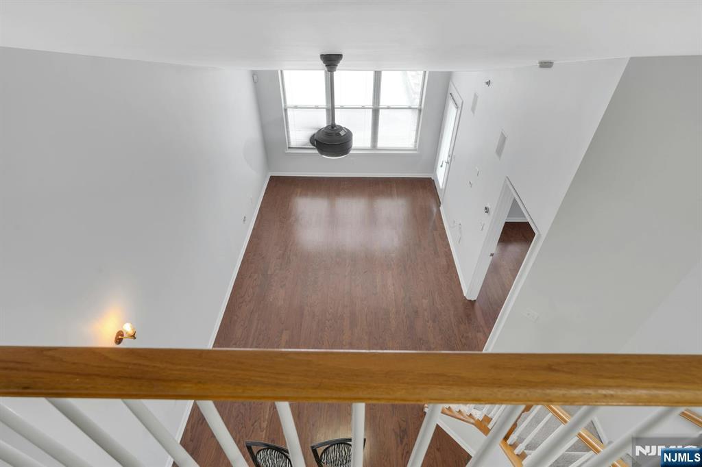 24 Ave At Port Imperial, Unit 401 West New York, NJ 07093 - Photo 17 of 27 a view of wooden floor and a window in a room