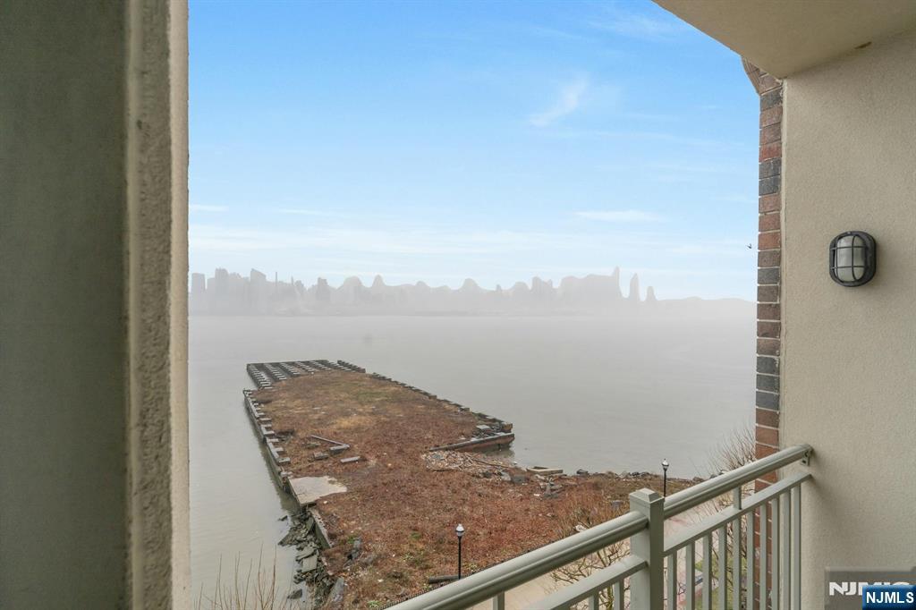 24 Ave At Port Imperial, Unit 401 West New York, NJ 07093 - Photo 18 of 27 a view of a balcony with an ocean view