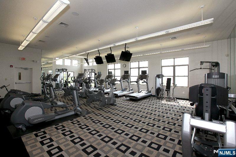 24 Ave At Port Imperial, Unit 401 West New York, NJ 07093 - Photo 24 of 27 a view of a room with gym equipment