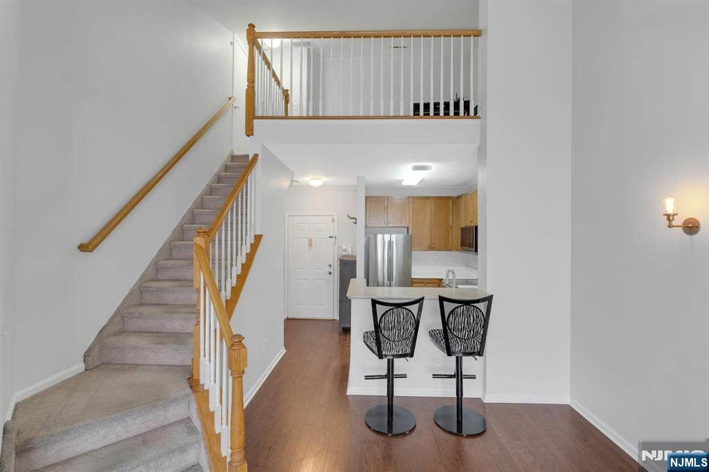 24 Ave At Port Imperial, Unit 401 West New York, NJ 07093 - Photo 8 of 27 a view of entryway and hall with wooden floor