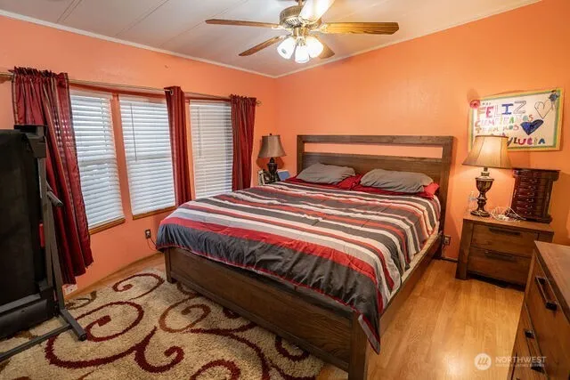 a bathroom with sink a mirror a vanity and a shower