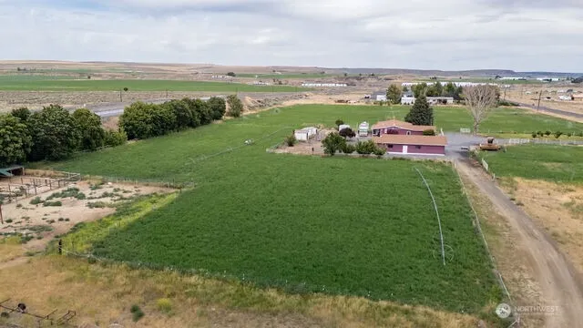a view of a lake with a yard
