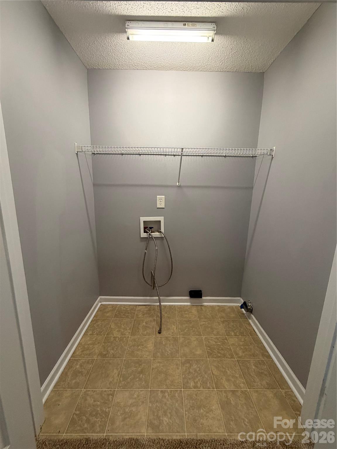 110 Steam Engine Drive, Unit 202 Mooresville, NC 28115 - Photo 23 of 26 a bathroom with a shower