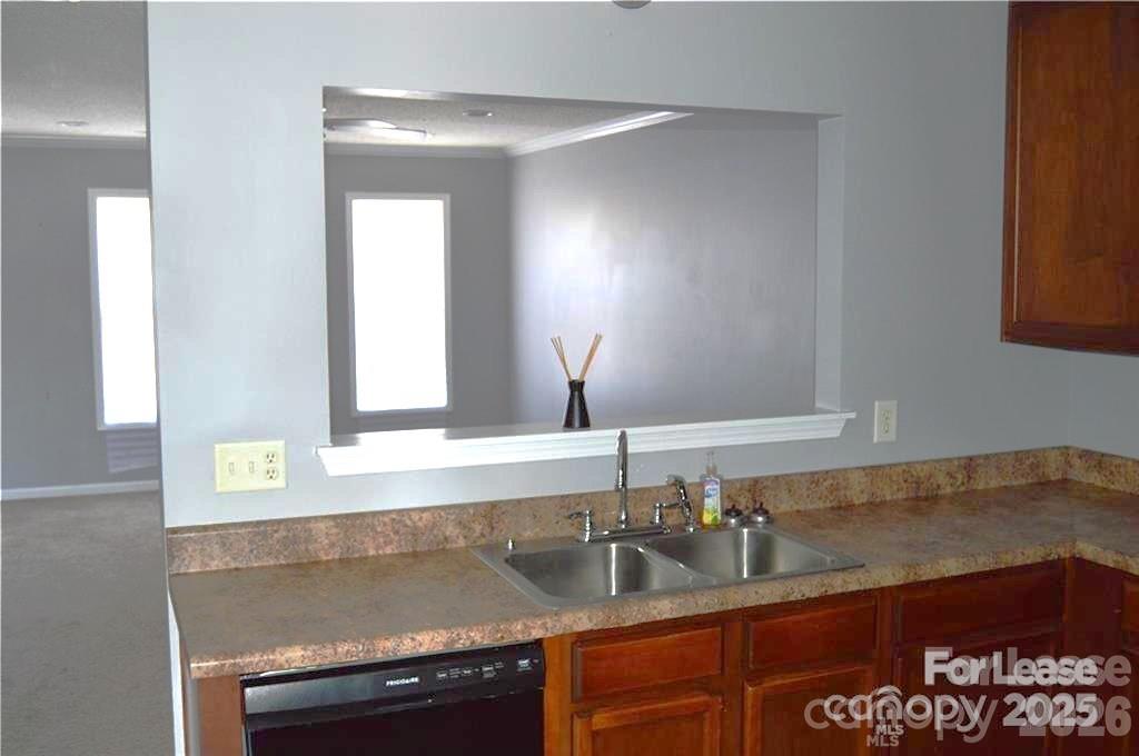 110 Steam Engine Drive, Unit 202 Mooresville, NC 28115 - Photo 4 of 26 a bathroom with a sink and a mirror