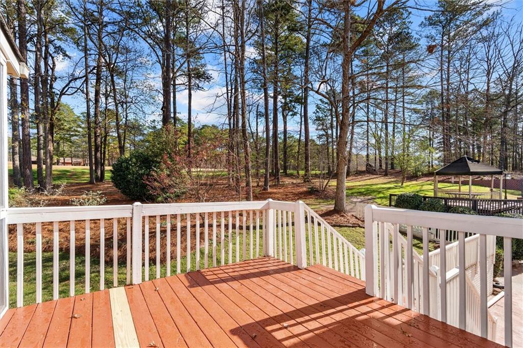 1030 Lakeview Parkway Villa Rica, GA 30180 - Photo 33 of 46 a view of a wooden roof deck