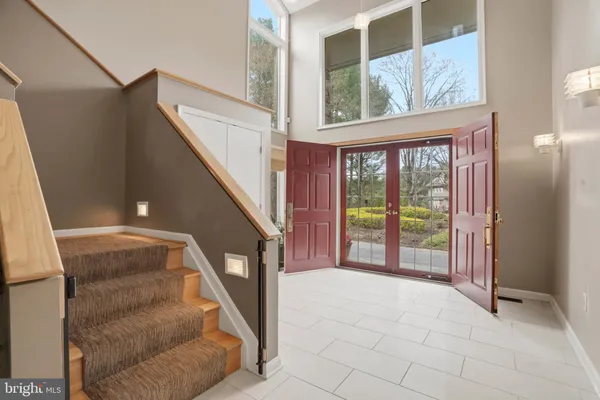 a view of an entryway with sitting area
