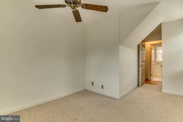 a view of a room with rack on the wall