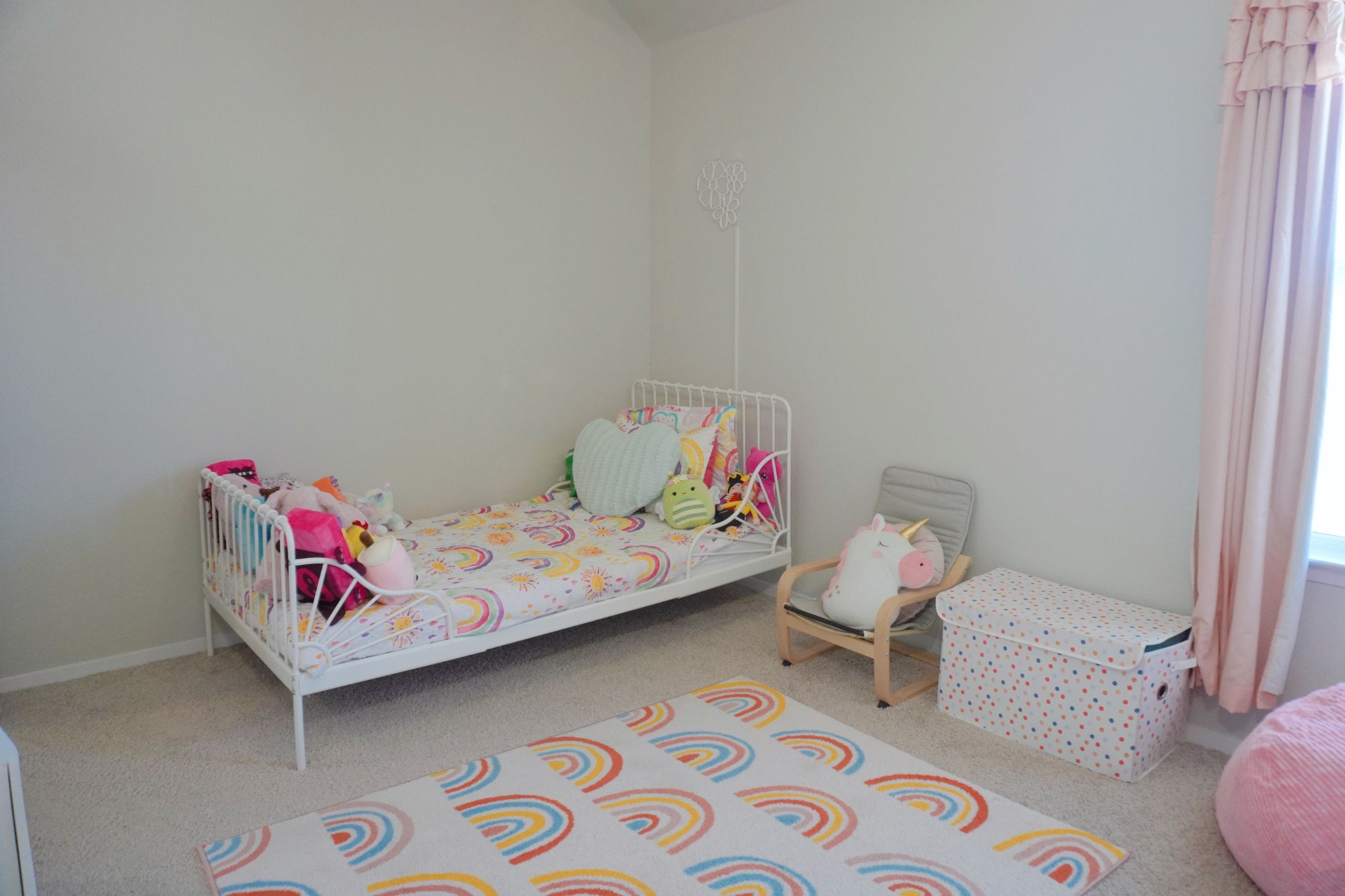 153 Blue Agate Court Jarrell, TX 76537 - Photo 12 of 20 a bedroom with a bed and a couch