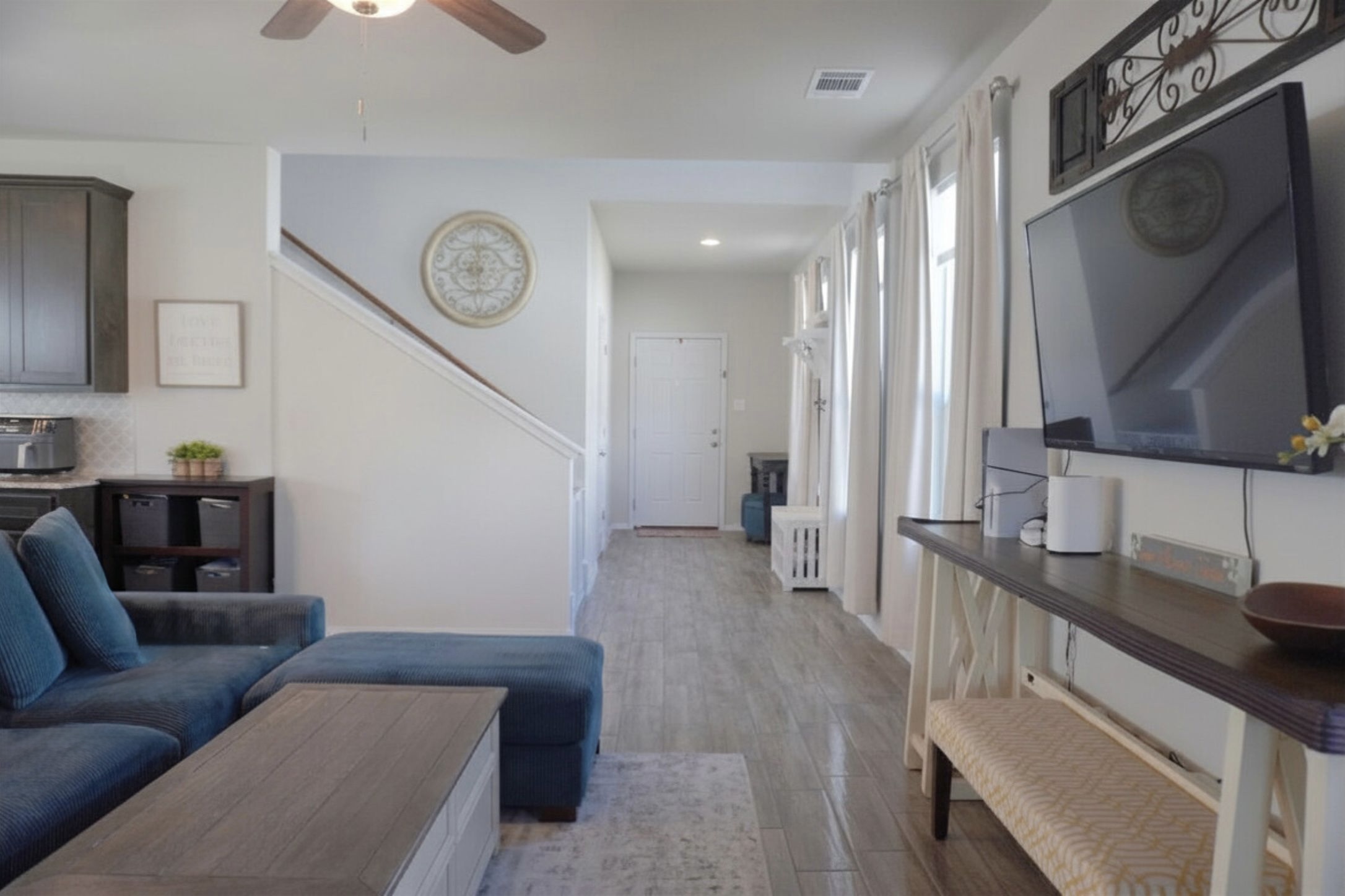 153 Blue Agate Court Jarrell, TX 76537 - Photo 3 of 20 a living room with furniture and a large window