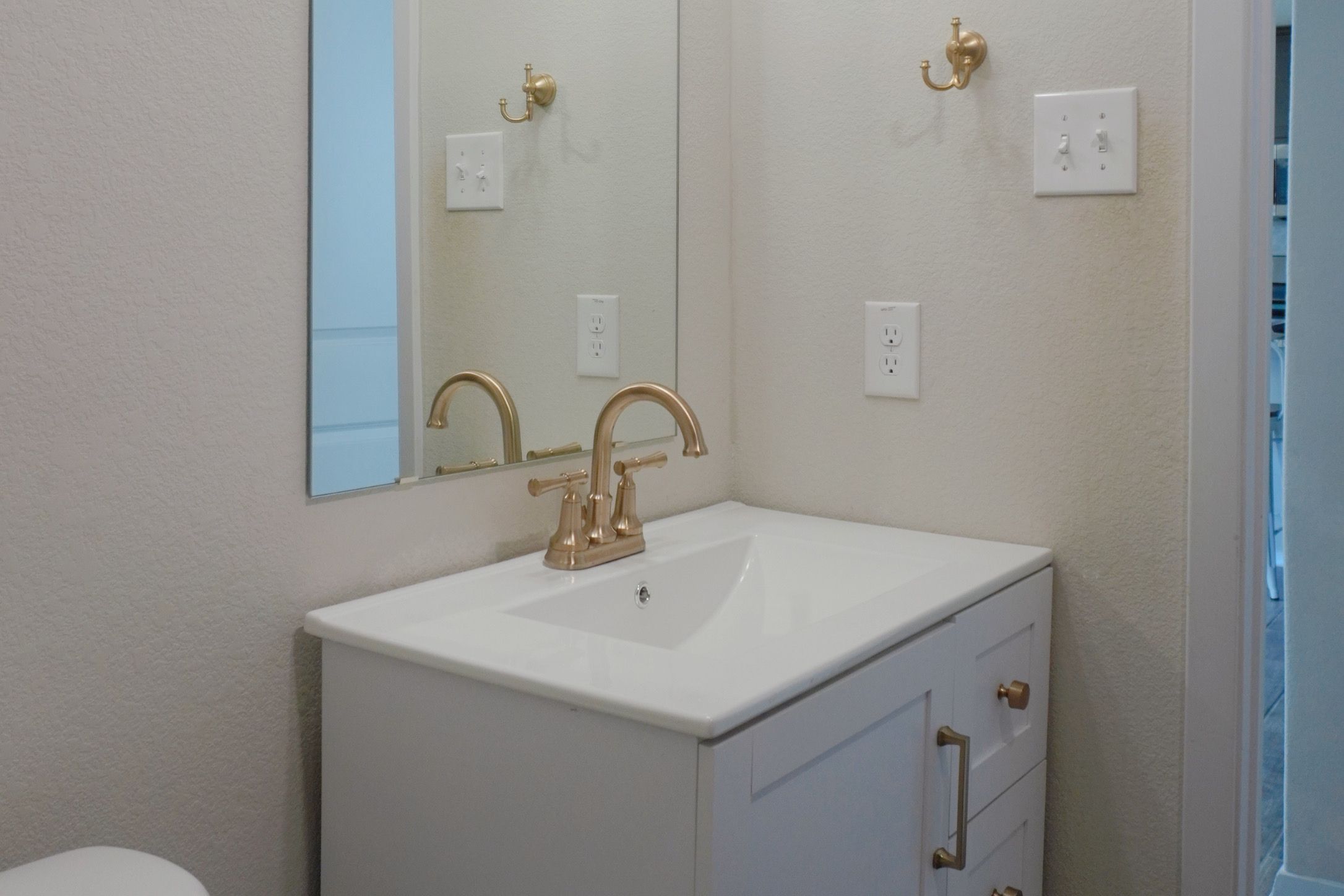 153 Blue Agate Court Jarrell, TX 76537 - Photo 9 of 20 a close view of a sink and tap