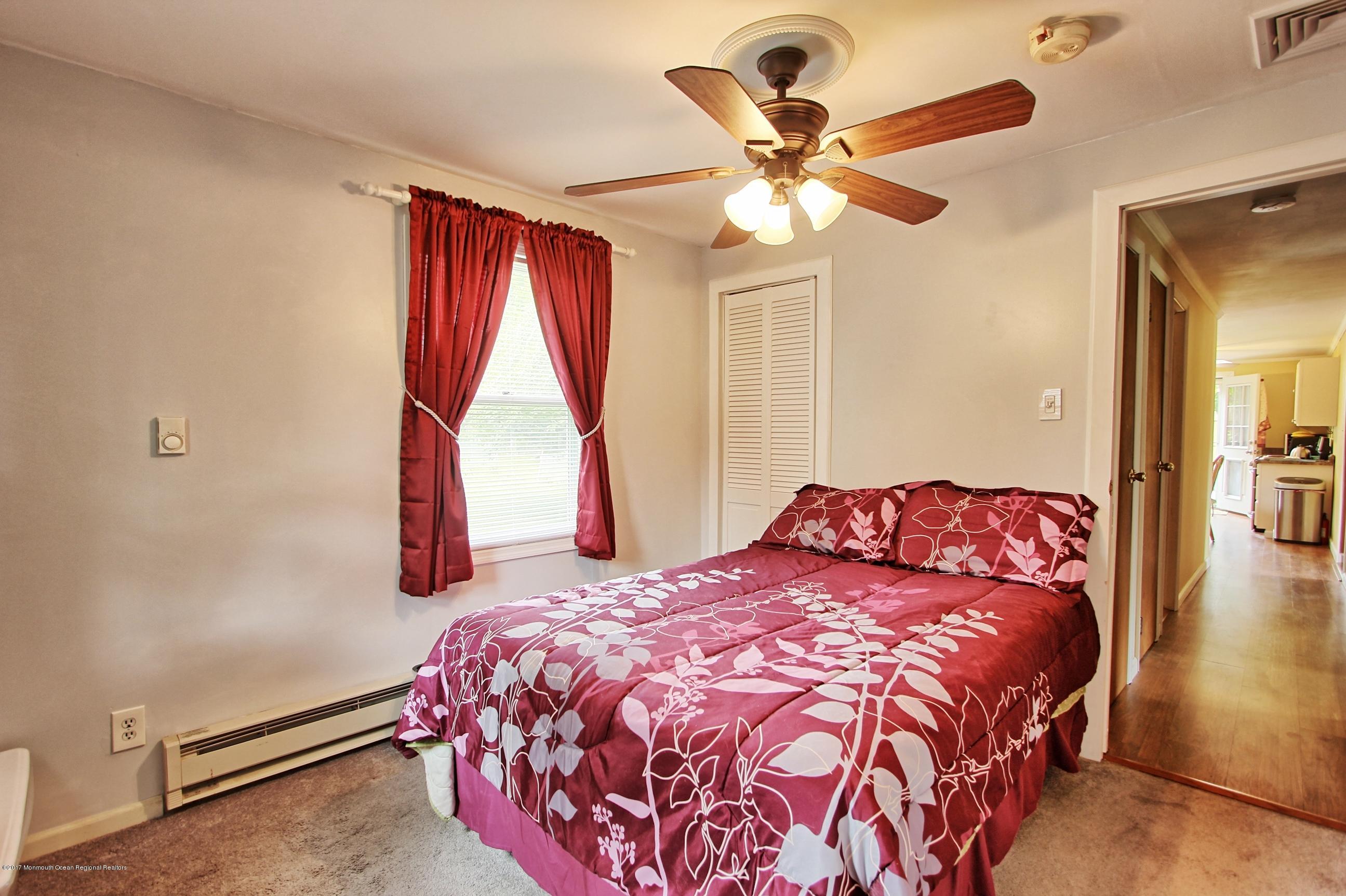 49 Siloam Road Freehold, NJ 07728 - Photo 14 of 38 a bedroom with a bed and window