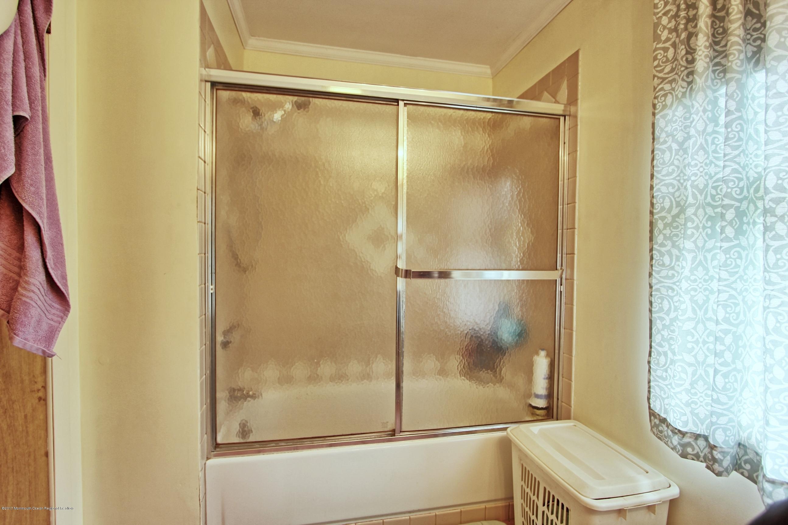 49 Siloam Road Freehold, NJ 07728 - Photo 20 of 38 a bathroom with a shower