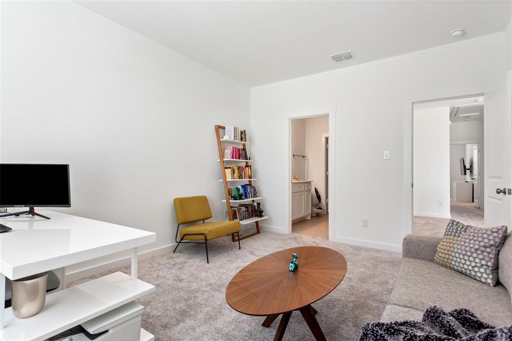 1737 Dalhart Road Plano, TX 75075 - Photo 17 of 28 a living room with furniture and a flat screen tv