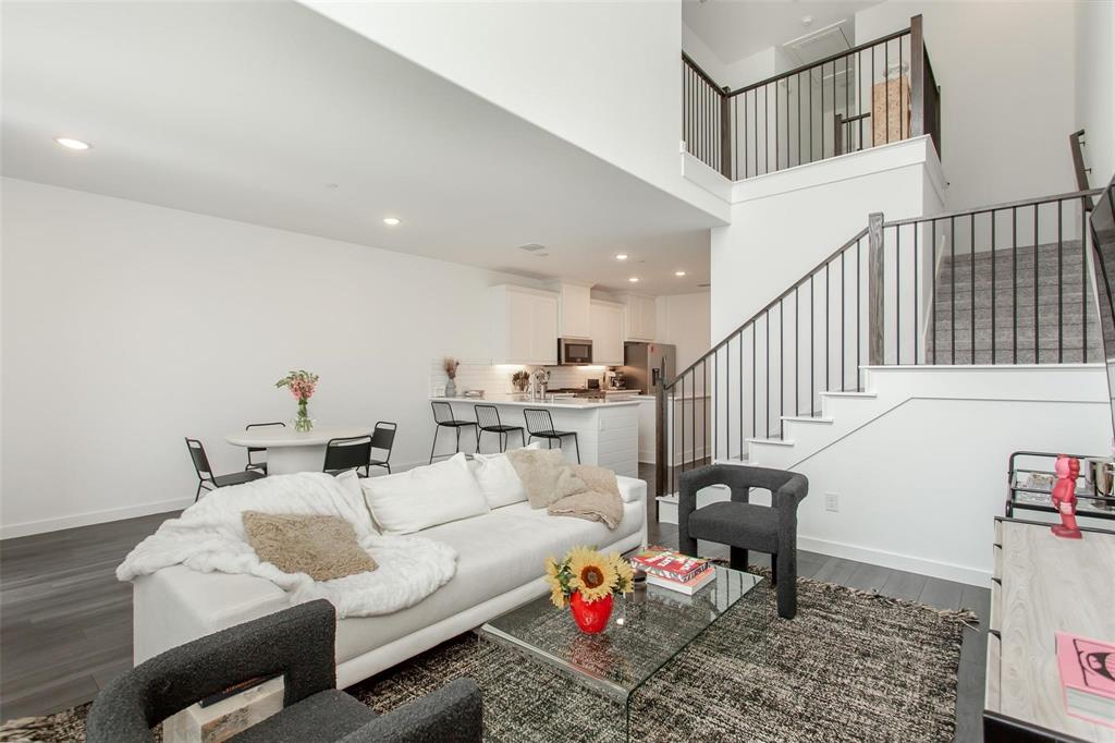 1737 Dalhart Road Plano, TX 75075 - Photo 2 of 28 a living room with furniture and a table