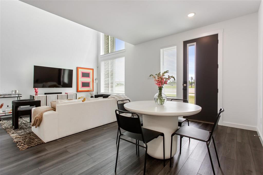 1737 Dalhart Road Plano, TX 75075 - Photo 4 of 28 a view of a dining room with furniture window and wooden floor