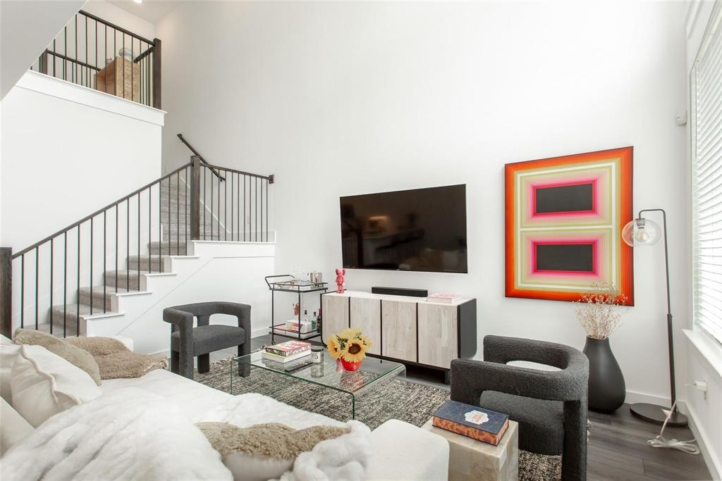 1737 Dalhart Road Plano, TX 75075 - Photo 6 of 28 a living room with furniture and a flat screen tv