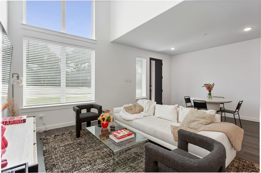 1737 Dalhart Road Plano, TX 75075 - Photo 7 of 28 a living room with furniture and a window