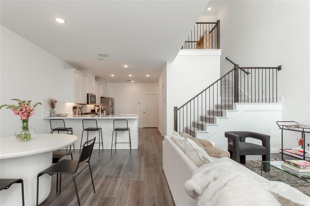 1737 Dalhart Road Plano, TX 75075 - Photo 8 of 28 a dining room with furniture and wooden floor