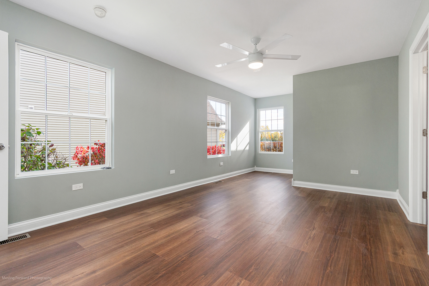 280 Sunset Boulevard Beecher, IL 60401 - Photo 17 of 48 an empty room with wooden floor and windows