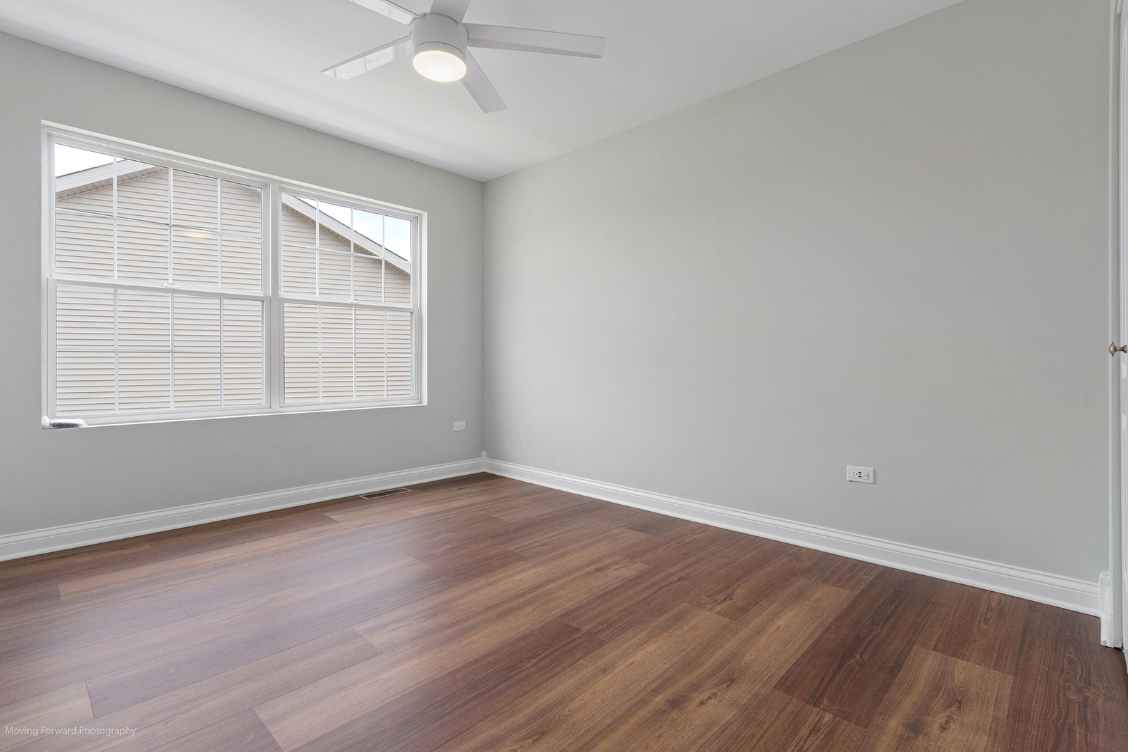 280 Sunset Boulevard Beecher, IL 60401 - Photo 20 of 48 an empty room with wooden floor and windows