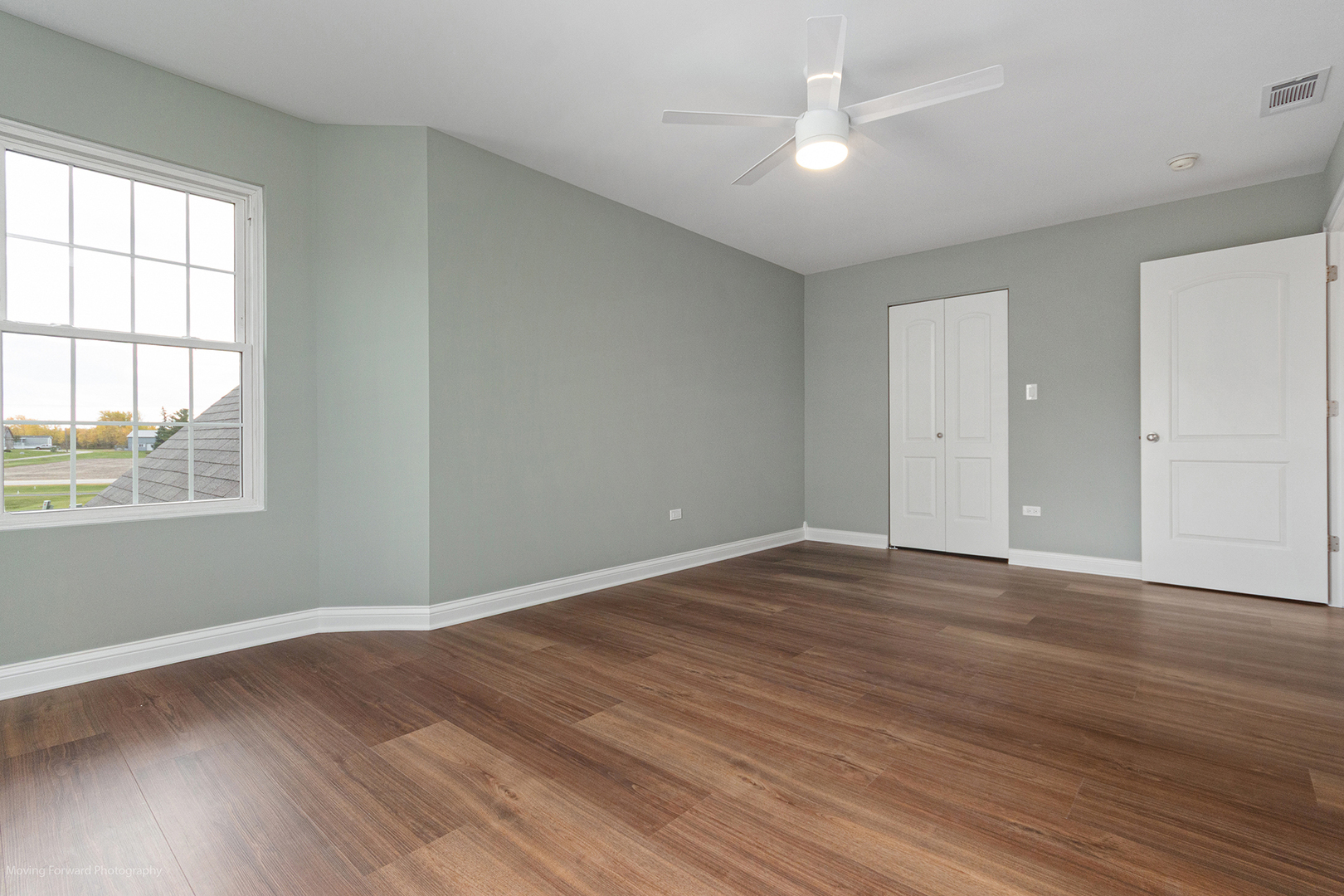 280 Sunset Boulevard Beecher, IL 60401 - Photo 23 of 48 an empty room with wooden floor and windows