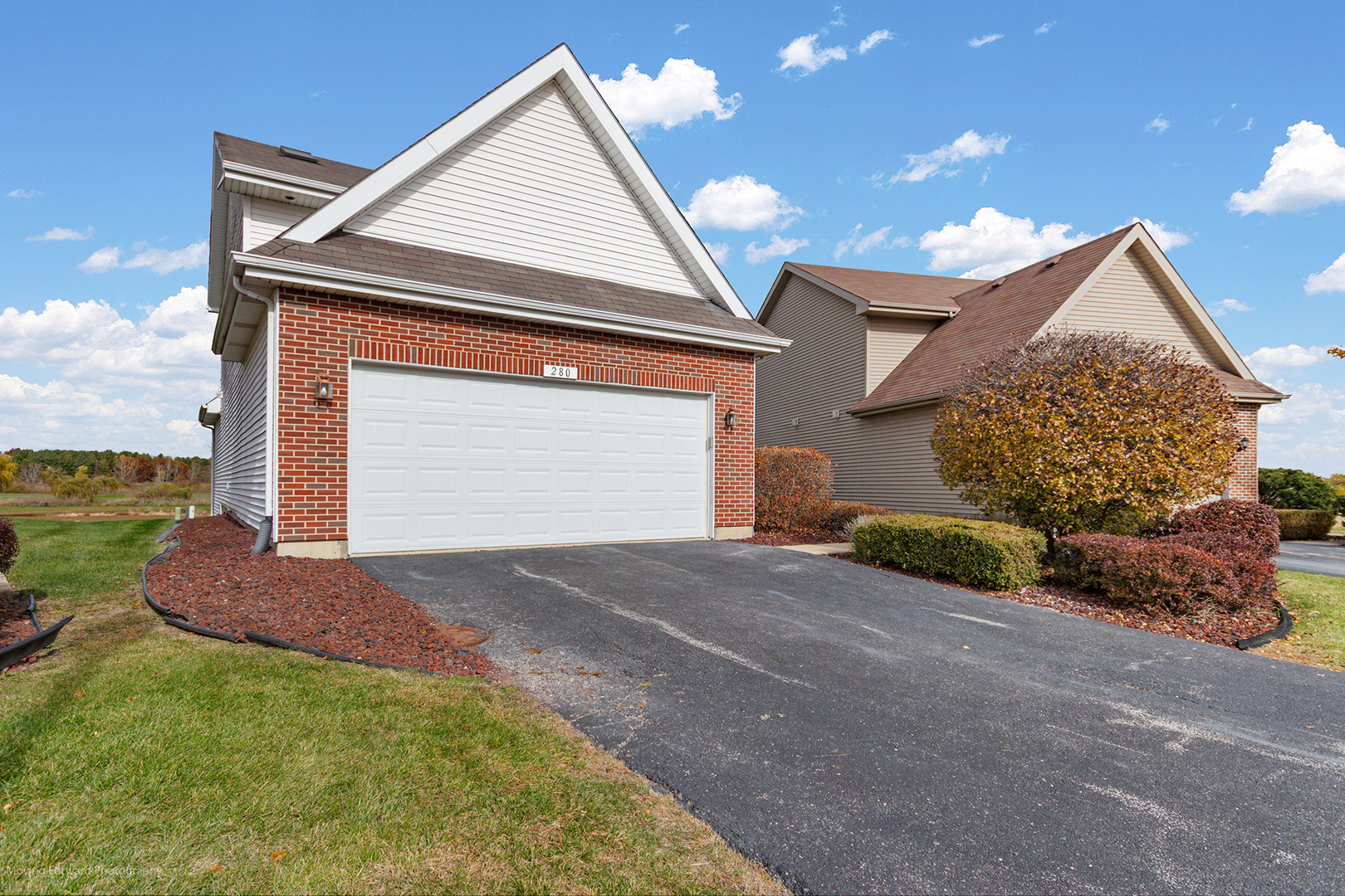 280 Sunset Boulevard Beecher, IL 60401 - Photo 44 of 48 a front view of a house with a yard and garage