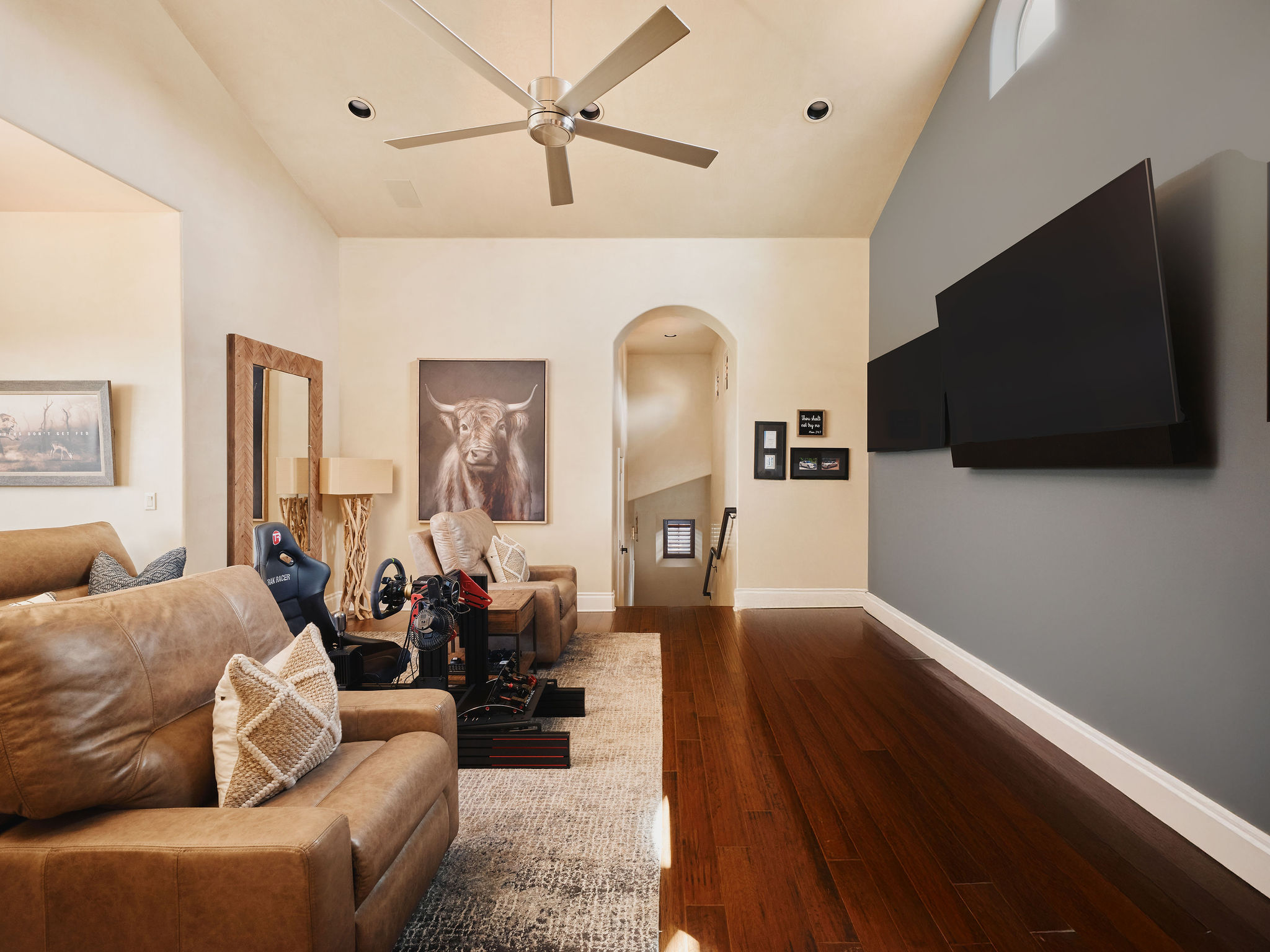 433 Brandon Way Austin, TX 78733 - Photo 29 of 40 Hardwood floors and soaring ceilings create an open, airy living space.