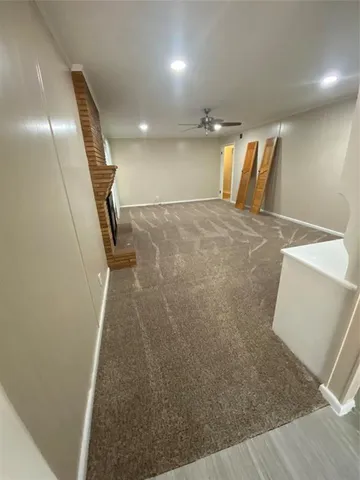 a view of an empty room and window