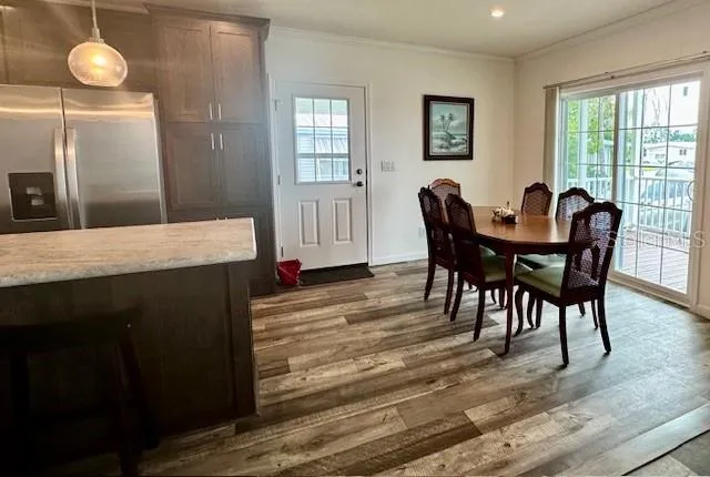 a bedroom with furniture and a flat screen tv
