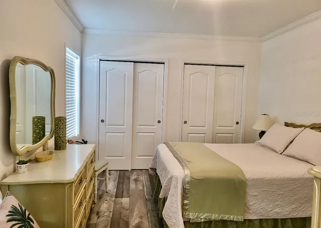 a bathroom with a shower a toilet and a shower