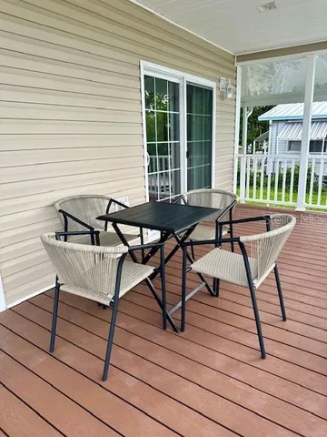 a house view with outdoor seating space