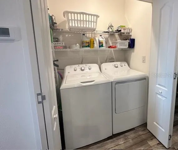 a utility room with dryer and washer