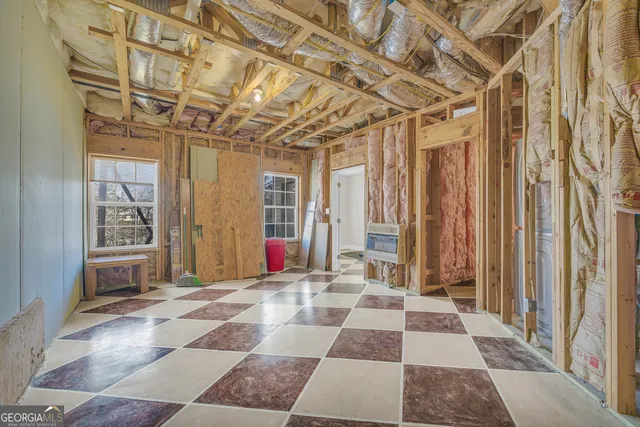 a view of a room with a rug