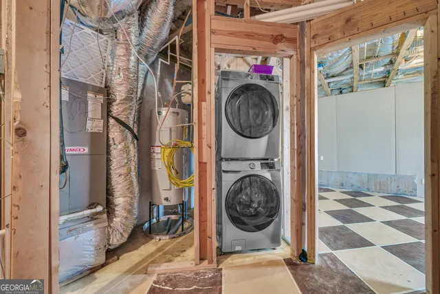 a utility room with dryer and washer