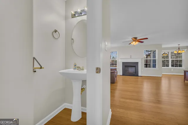 a bathroom with a sink bath tub and shower