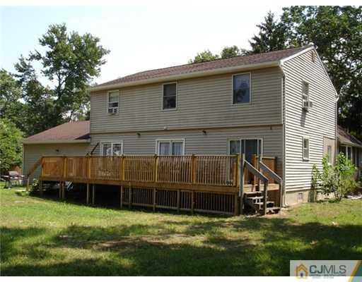 800 Farmingdale Road Jackson, NJ 08527 - Photo 3 of 22 a view of a house with a yard