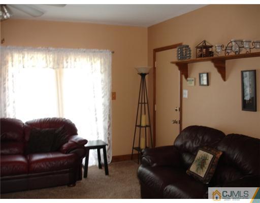 800 Farmingdale Road Jackson, NJ 08527 - Photo 7 of 22 a living room with furniture and a window