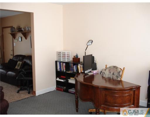 800 Farmingdale Road Jackson, NJ 08527 - Photo 9 of 22 a view of workspace with a couch