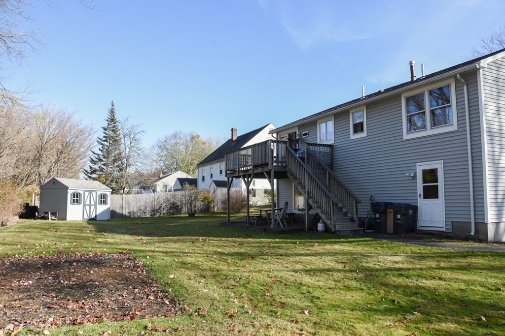 43 Russell Street Methuen, MA 01844 - Photo 3 of 37 a view of a house with a yard