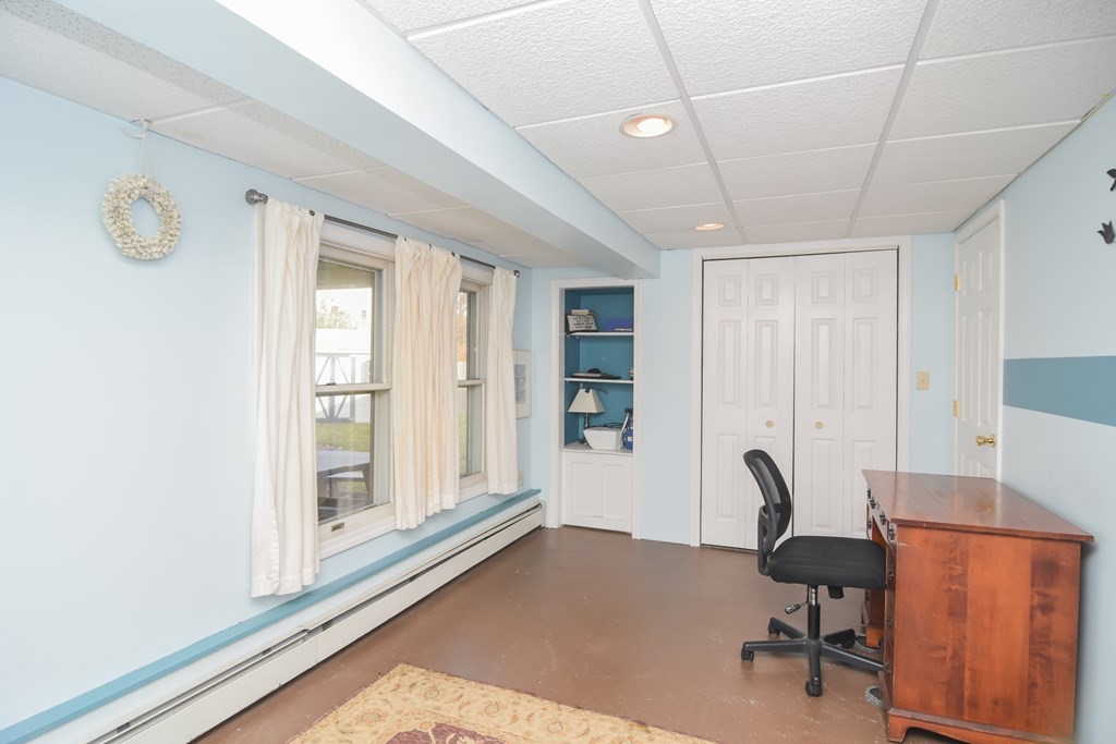 43 Russell Street Methuen, MA 01844 - Photo 33 of 37 a view of a workspace with furniture and a window